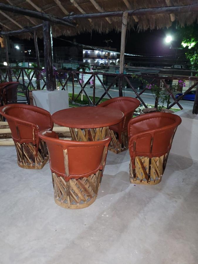 Mio Tulum Hotel Boutique Exterior photo A set of equipales