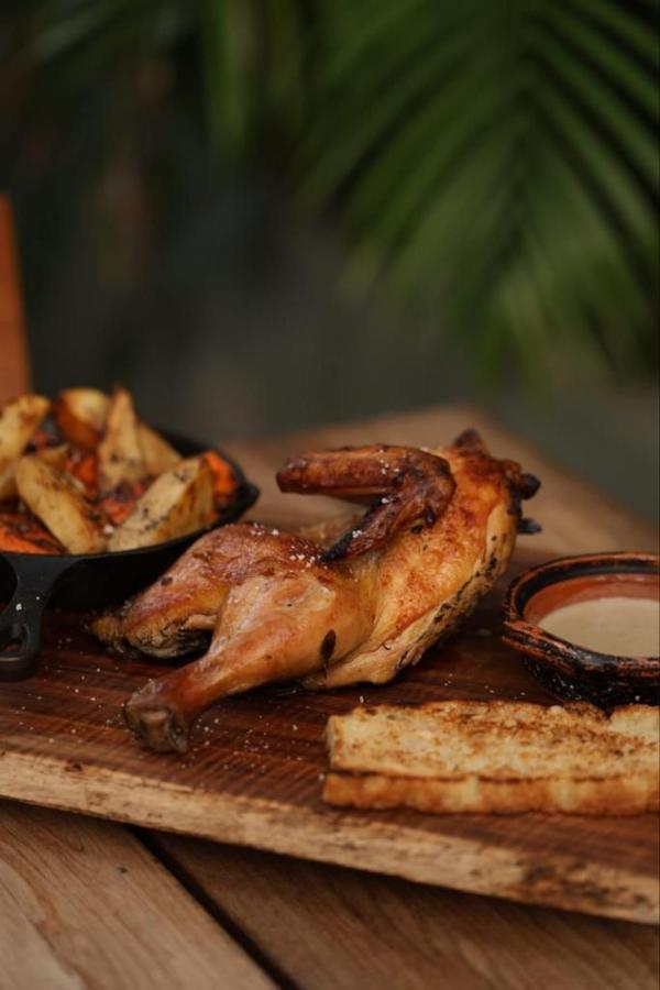Mio Tulum Hotel Boutique Exterior photo A half chicken